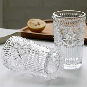 https://belle-blu.com/cdn/shop/products/Antique-Class-Cups-Clear-Color-Fancy-Embossed-Glass-Cups-Sunflower-Pattern-Juice-Wine-Milk-Cup-Glassware_35acea06-5a58-45d2-82e1-5afe5314cd20_300x.jpg?v=1537157709